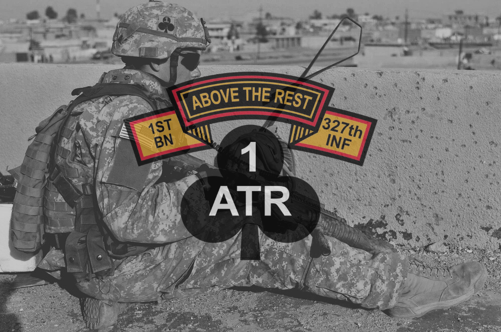 1-327 Infantry Regiment Insignia over image from operation Guagamela