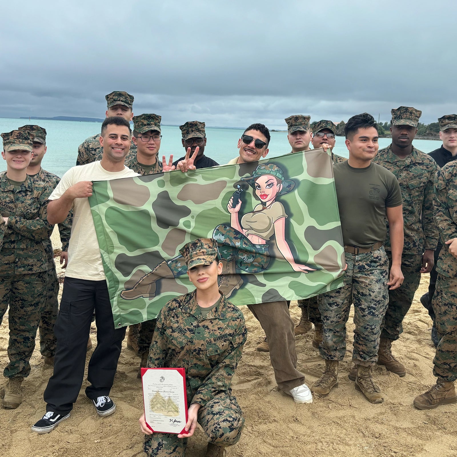 Yesi’s USMC Pin-Up Girl Frogskin Camo Taser Flag Tactically Acquired