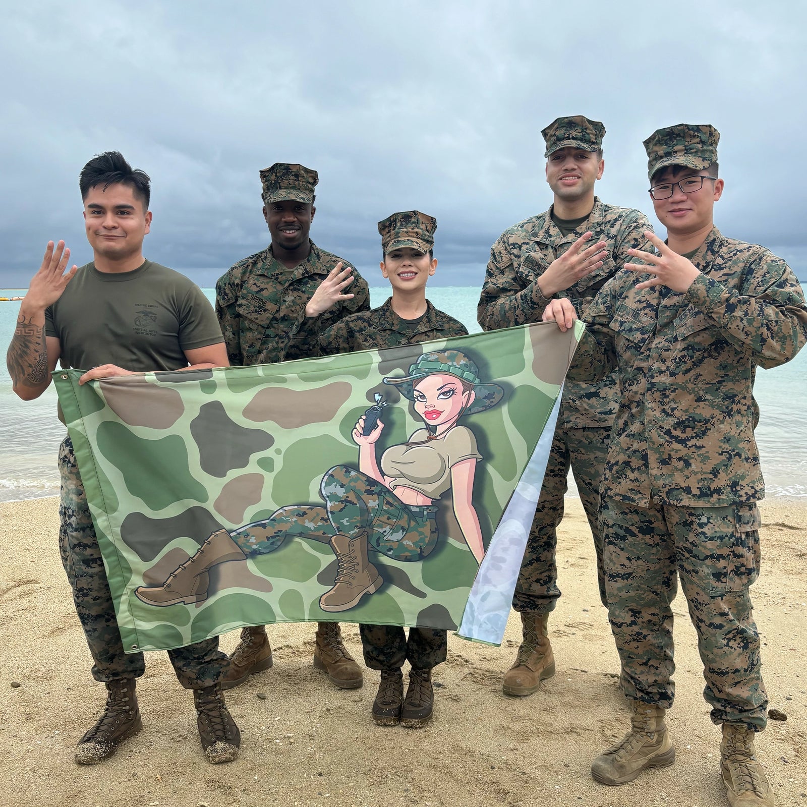 Yesi’s USMC Pin-Up Girl Frogskin Camo Taser Flag Tactically Acquired