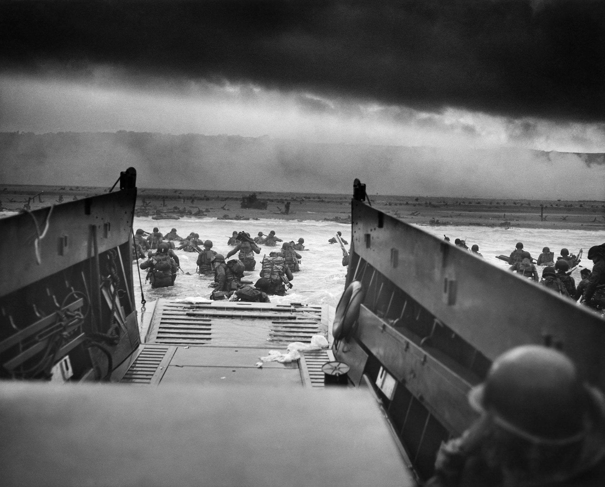 US troops landing on Omaha Beach on June 6, 1944, representing Tactically Acquired Army WW2 merchandise collection.